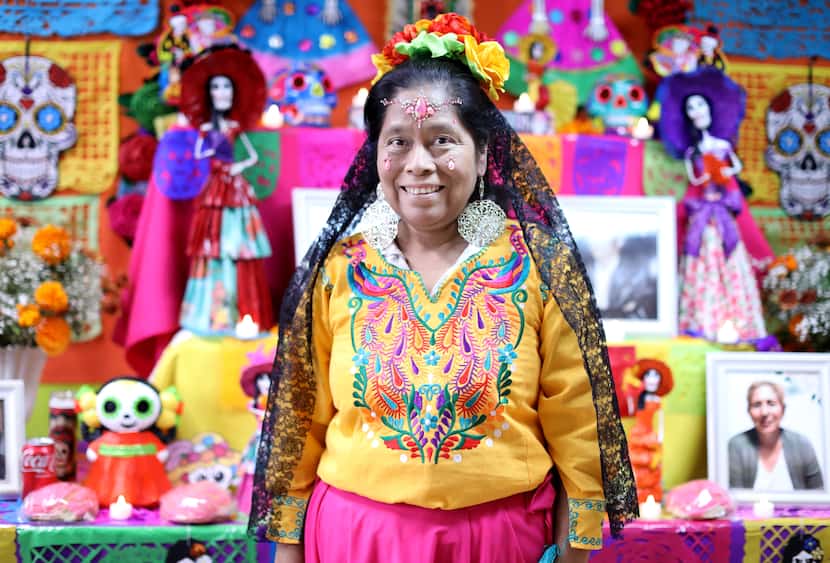 Juanita Hernández displays a Día de los Muertos ofrenda at her Flowers 2 U business in Dallas.