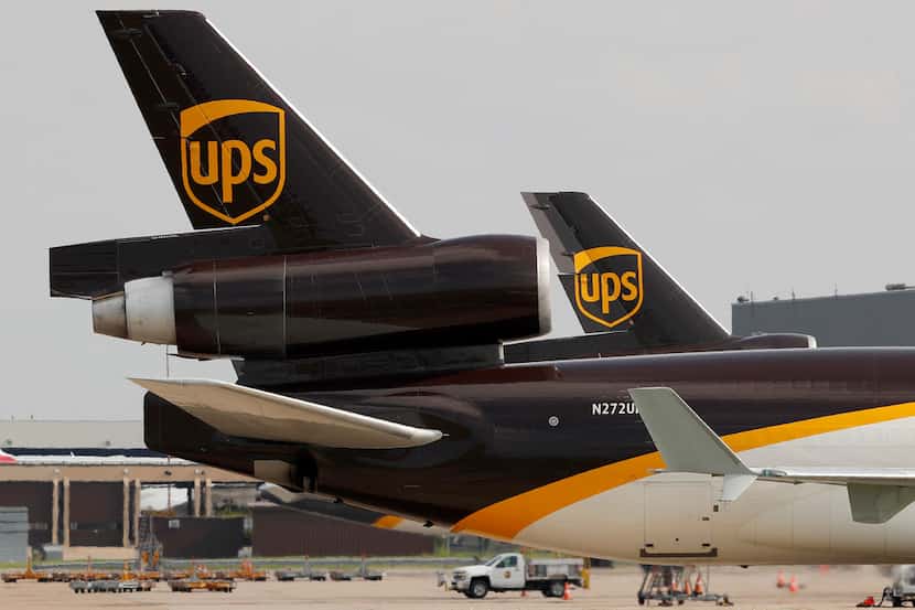 A United Parcel Service aircraft taxis to its hangar area after it arrived at DFW Airport....