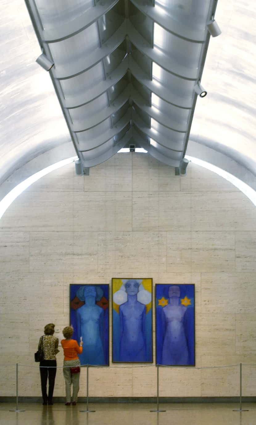 Patrons admire 'Evolution,' a painting by Mondrian, at the Kimbell Art Museum in Fort Worth...