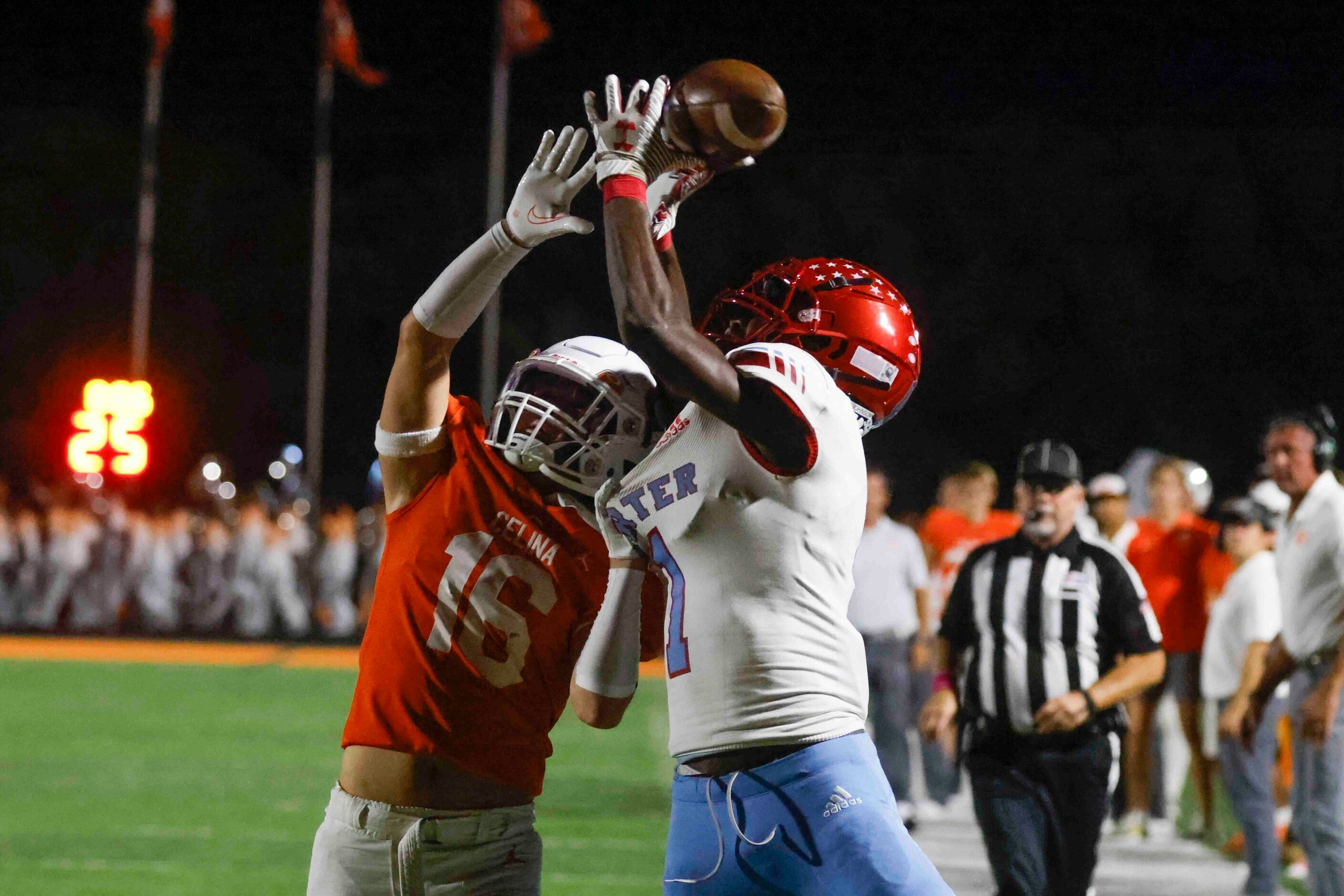 David W. Carter High School’s Niko Johnson (1), right, misses to receive a pass for a...