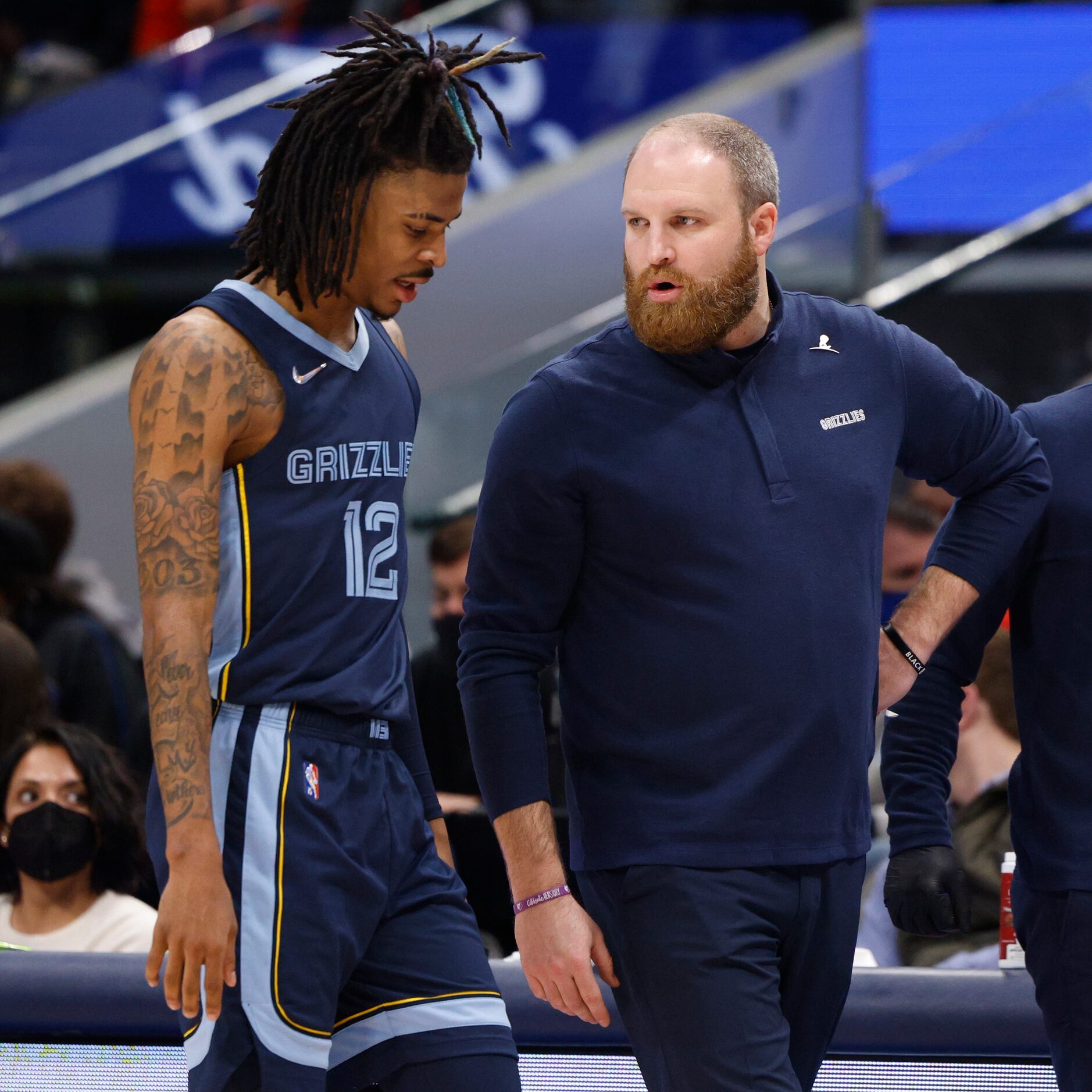 Memphis Grizzlies head coach Taylor Jenkins talks with Memphis Grizzlies guard Ja Morant...