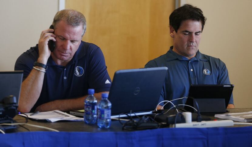 Director of Player Personnel Tony Ronzone and Owner Mark Cuban in the war room prior to the...
