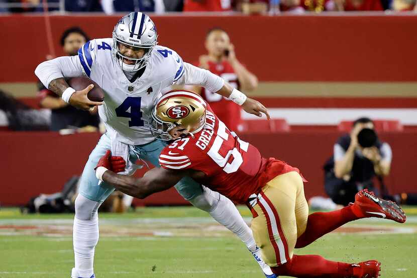 Dallas Cowboys quarterback Dak Prescott (4) is sacked late in the second quarter by San...