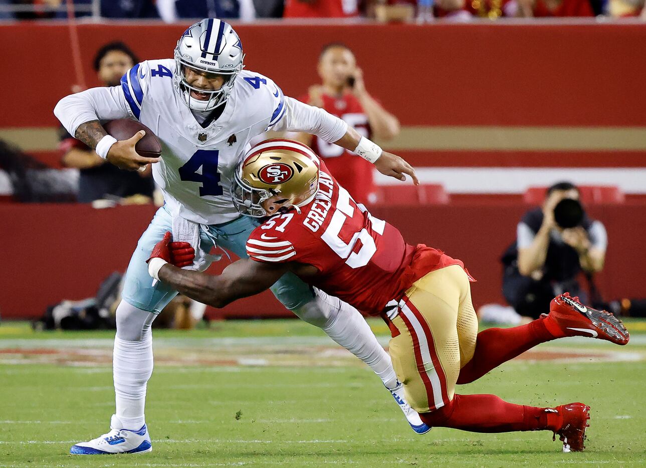 Dallas Cowboys quarterback Dak Prescott (4) is sacked late in the second quarter by San...