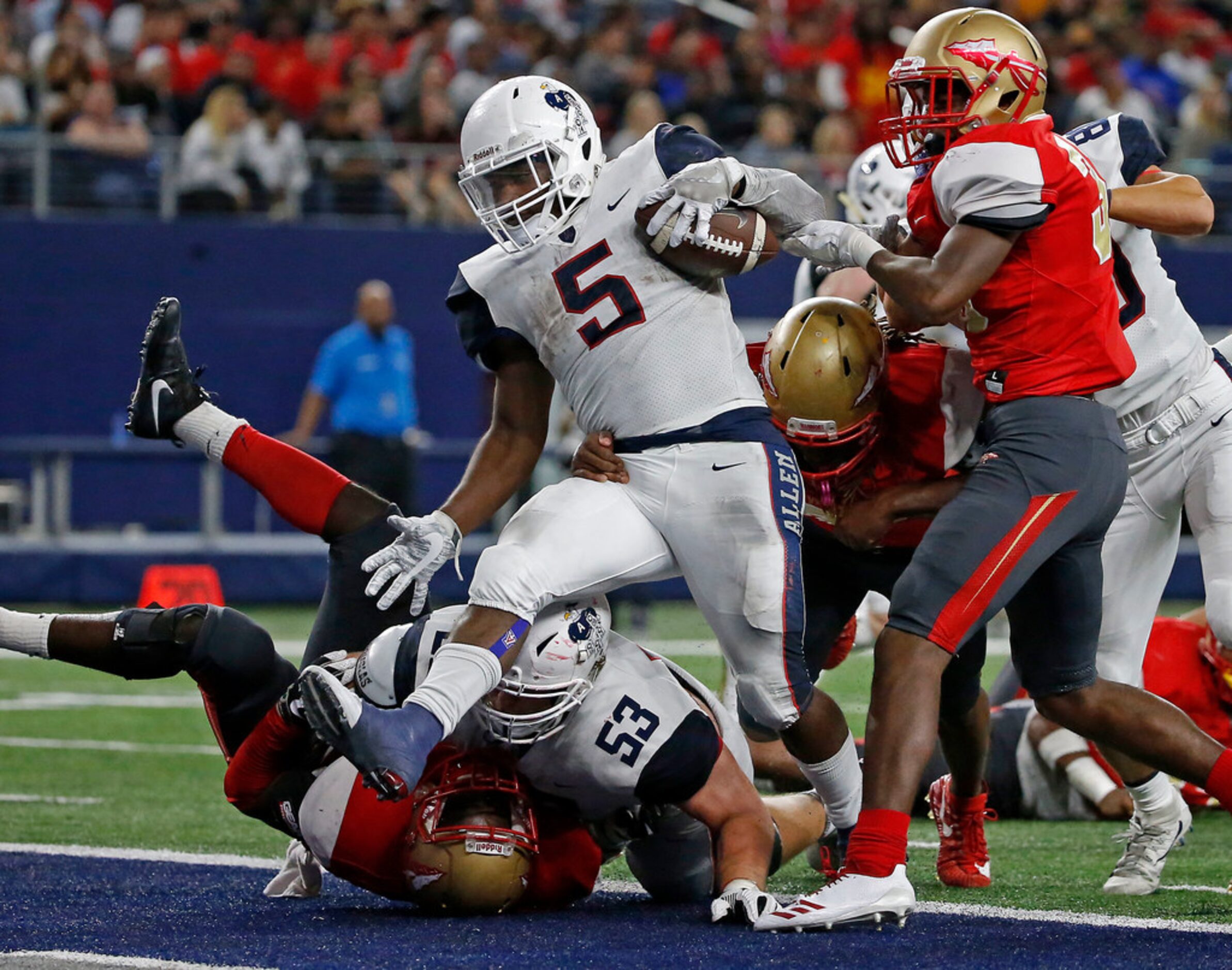 Allen's Brock Sturges (5) scores a touchdown against South Grand Prairie during the second...