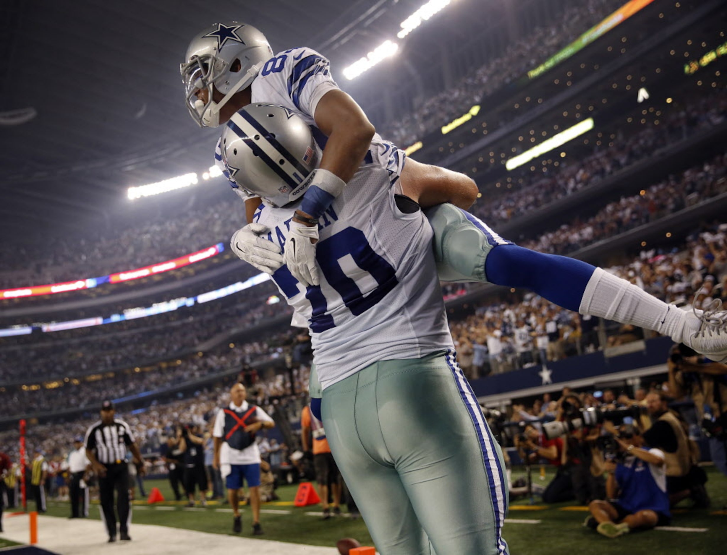 Dallas Cowboys wide receiver Terrance Williams (83) is hoisted into the air by teammate Zack...