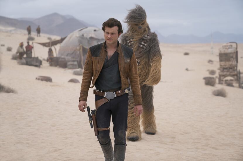 Alden Ehrenreich, left, as Han Solo and Joonas Suotamo as Chewbacca in "Solo: A Star Wars...