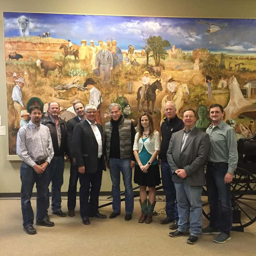 
A closing reception was held after the last papers were signed. From left are Dan...