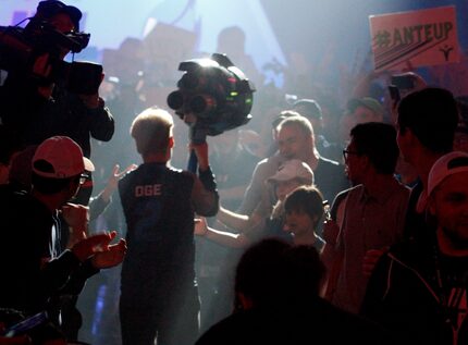 OGE runs through the crowd as he was introduced for the Overwatch League match between the...