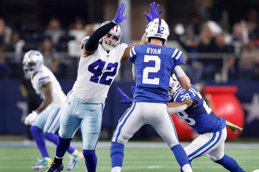 Dallas Cowboys linebacker Anthony Barr (42) rushes and sacks Indianapolis Colts quarterback...
