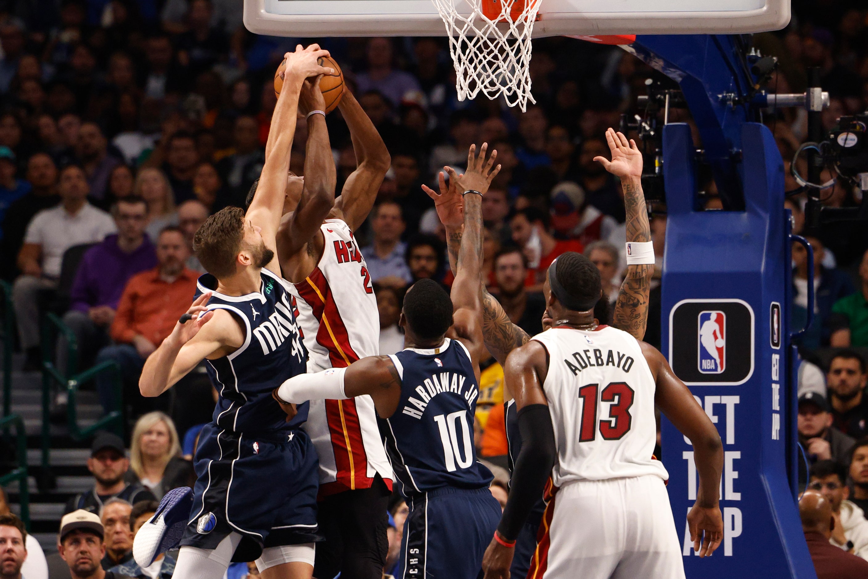 Dallas Mavericks forward Maxi Kleber (42) blocks a shot attempt by Miami Heat forward Jimmy...