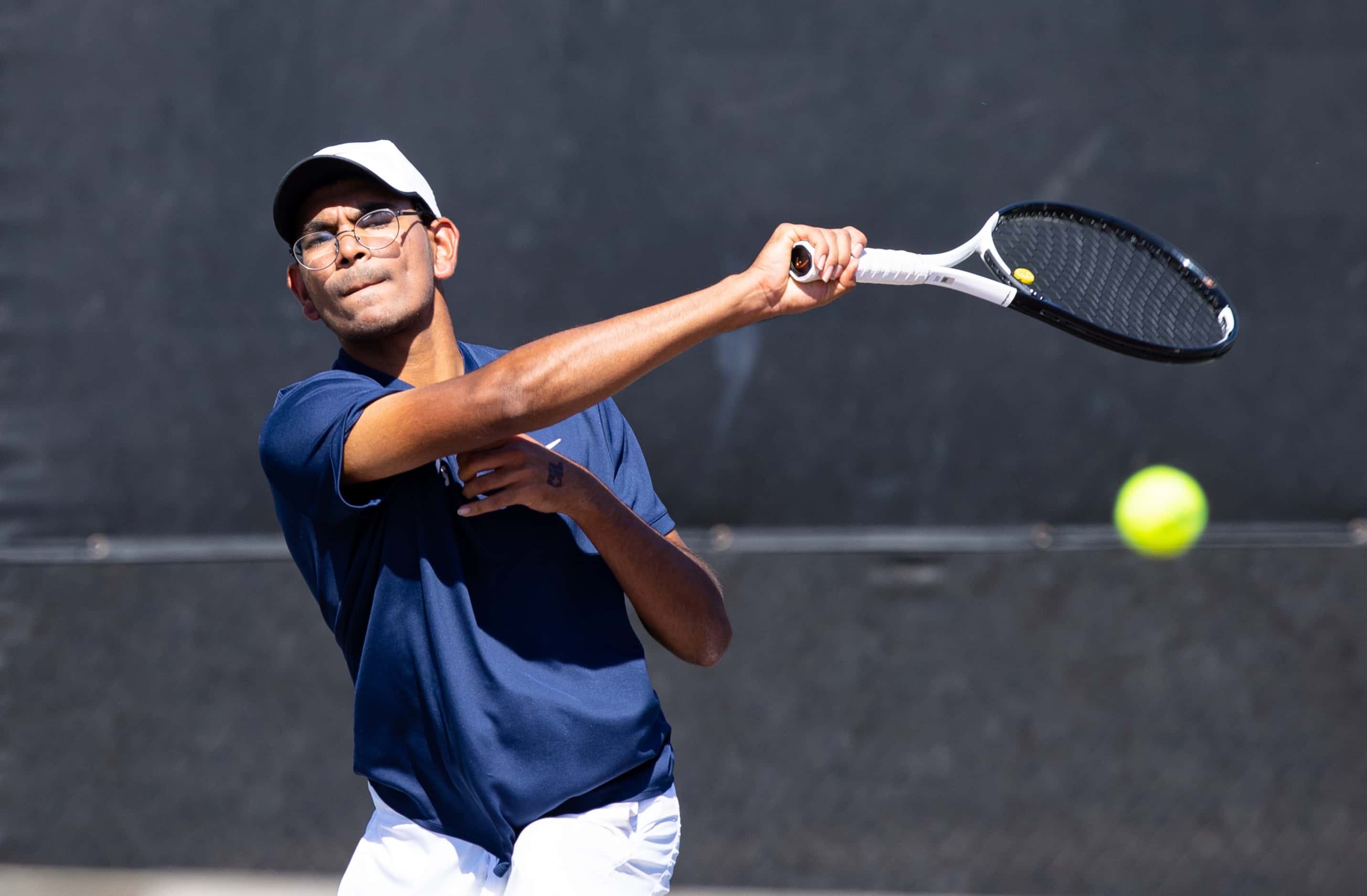 Frisco Centennial’s Tanish Gupt returns a shot during a doubles match with partner Rahul...