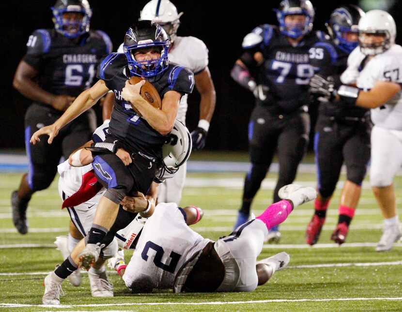 Dallas Christian freshman running back TJ King (7), is tackled on a run by Fort Worth All...