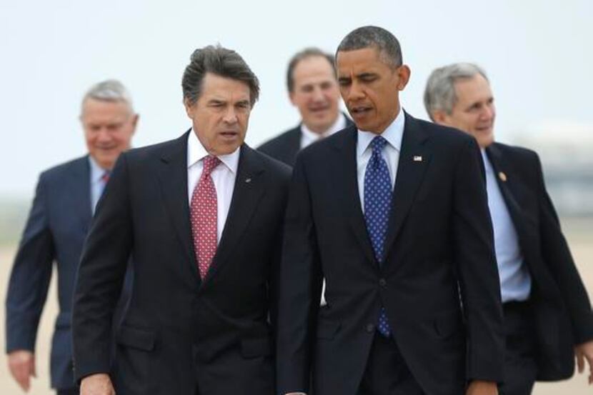 
Gov. Rick Perry, who talked with President Barack Obama on the tarmac at Austin-Bergstrom...