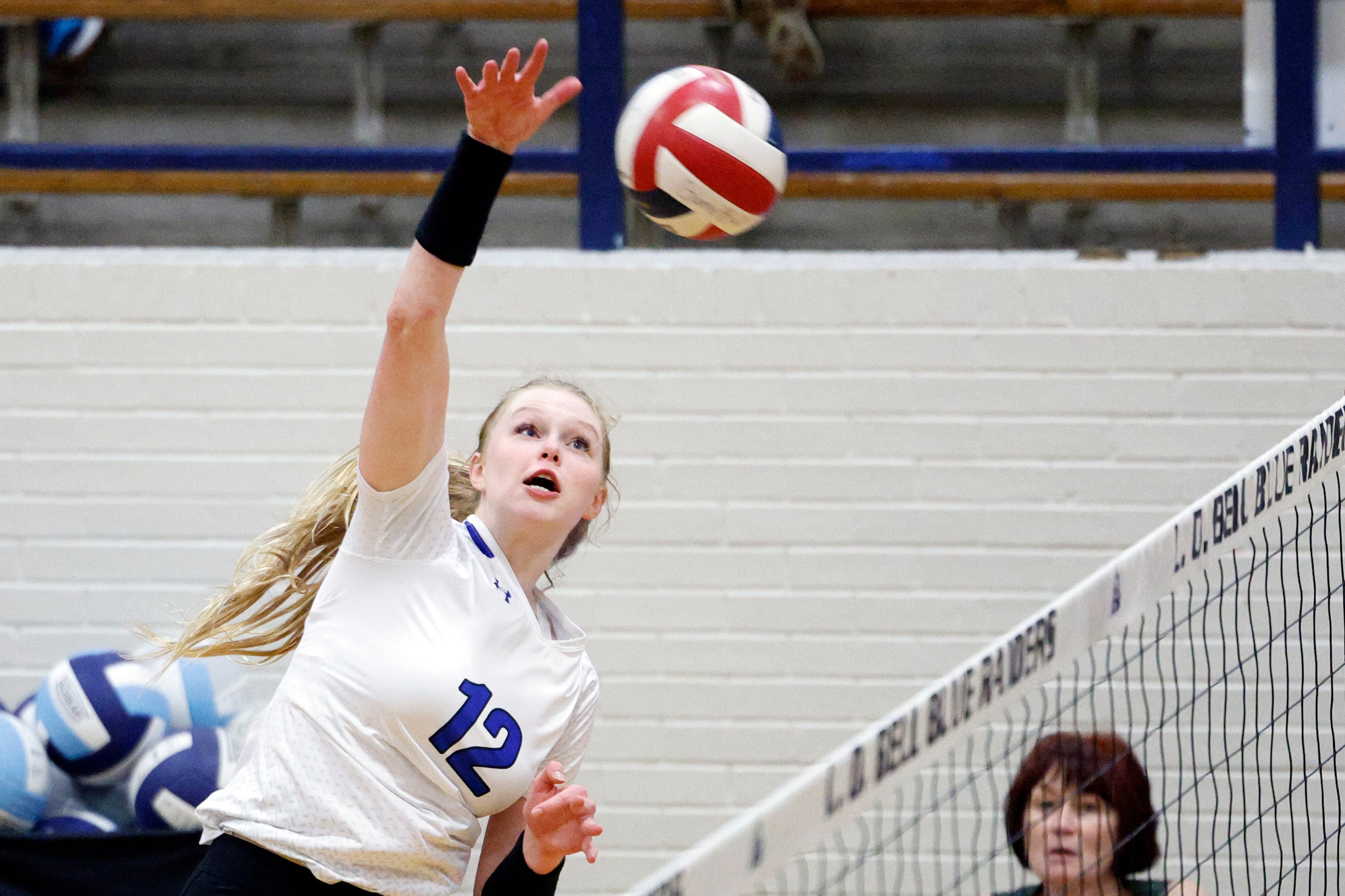 Trophy Club Byron Nelson's Ashlyn Seay (12) elevates for a kill during a volleyball match...