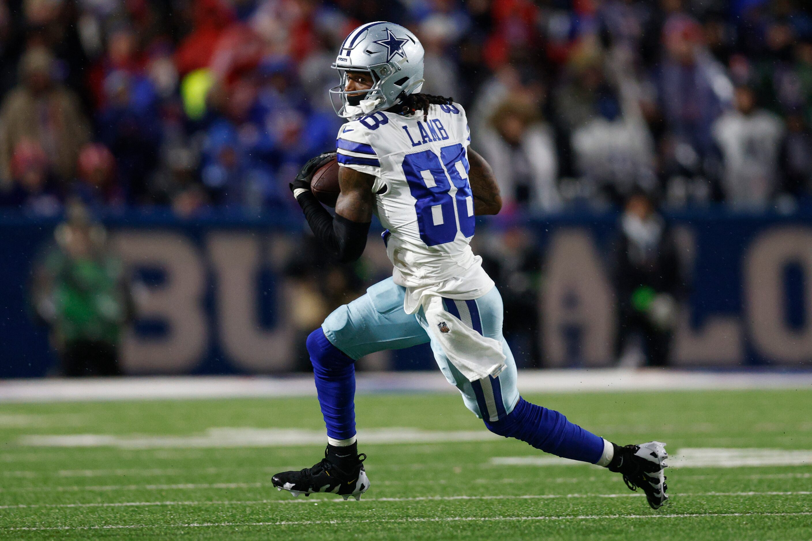 Dallas Cowboys wide receiver CeeDee Lamb (88) runs after catching a pass during the second...