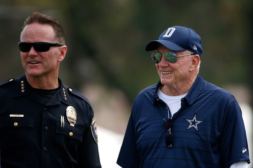 Dallas Cowboys owner Jerry Jones, right, talks with Oxnard Police Chief Scott Whitney during...