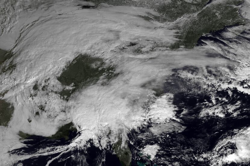 This Feb. 7 satellite image made available by NOAA shows storm systems covering most of the...