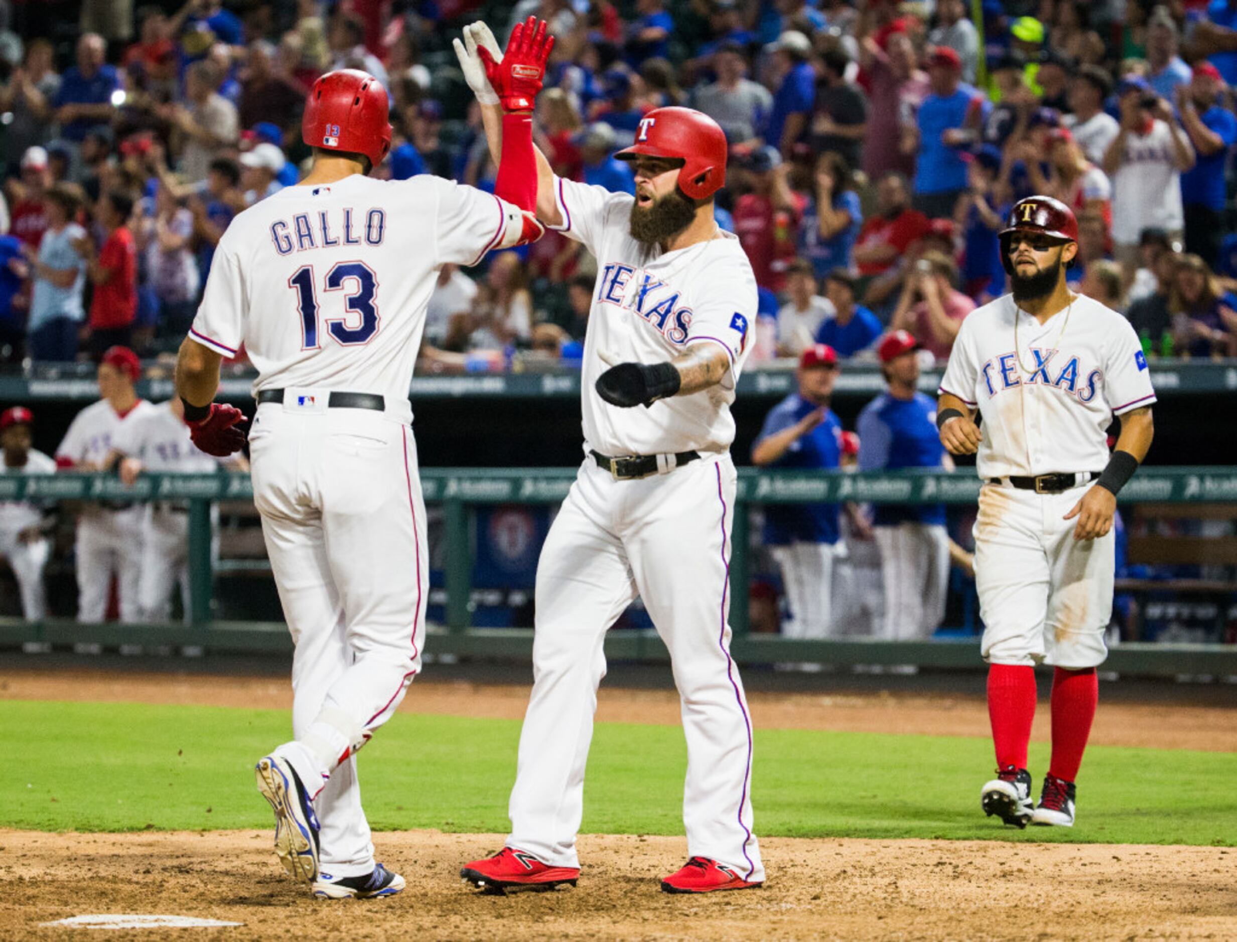 Texas Rangers shortstop Elvis Andrus (1) leaps over Houston Astros