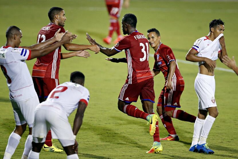 FC Dallas' Maynor Figueroa (31) celebrates his goal during the second half of Dallas' 2-1...