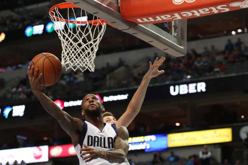 DALLAS, TX - DECEMBER 27:  Pierre Jackson #55 of the Dallas Mavericks drives to the basket...