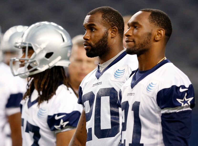 Cowboys running backs Darren McFadden (center) and Joseph Randle (right). (Vernon Bryant /...