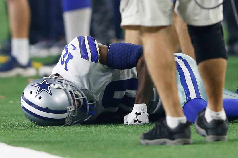 Dallas Cowboys wide receiver Tavon Austin (10) is slow to get up after injuring his groin on...