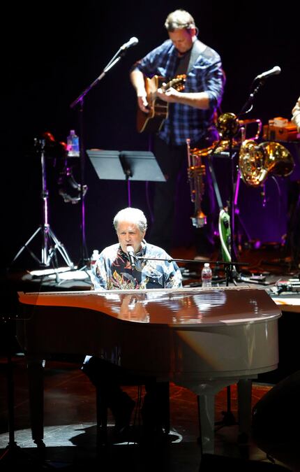 Beach Boys founding member Brian Wilson plays the piano as he performs at Verizon Theatre in...