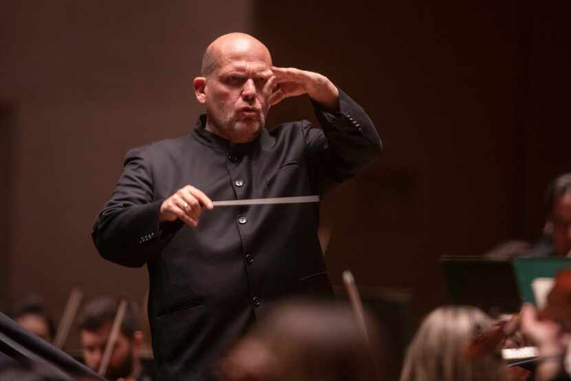 Dallas Symphony Orchestra conductor laureate Jaap van Zweden leads the orchestra in concert...