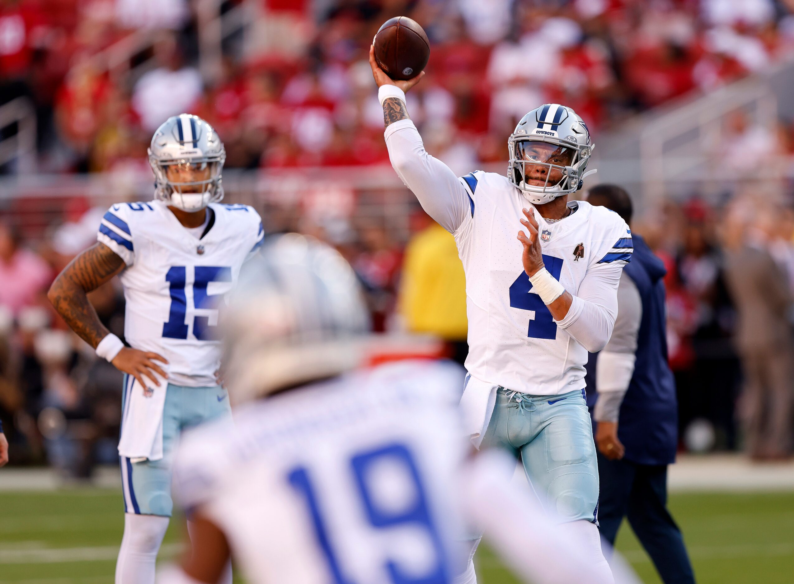 Dallas Cowboys quarterback Dak Prescott (4) throws to receivers during pregame warmups...