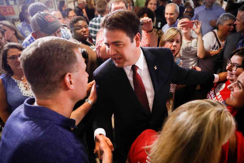 Danny O'Connor shakes hands with supporters during an election night watch party at the Ohio...