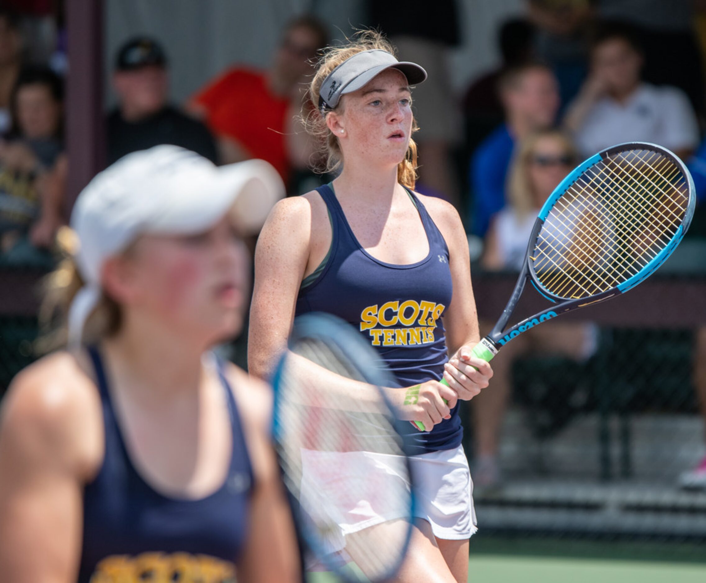 Highland Park's Cambelle Henderson and Brennan Becicka wait for the serve in a doubles match...