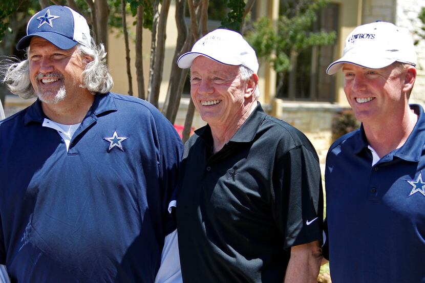 Dallas defensive coordinator Rob Ryan, owner Jerry Jones and head coach Jason Garrett pose...