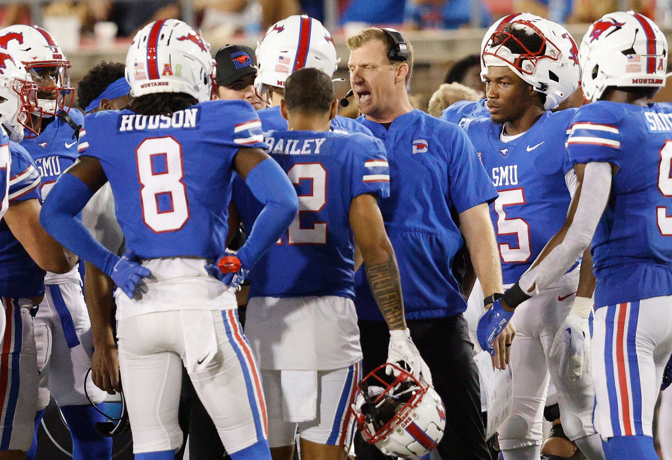 SMU head coach Rhett Lashlee, center, is seen during the second half of an NCAA college...