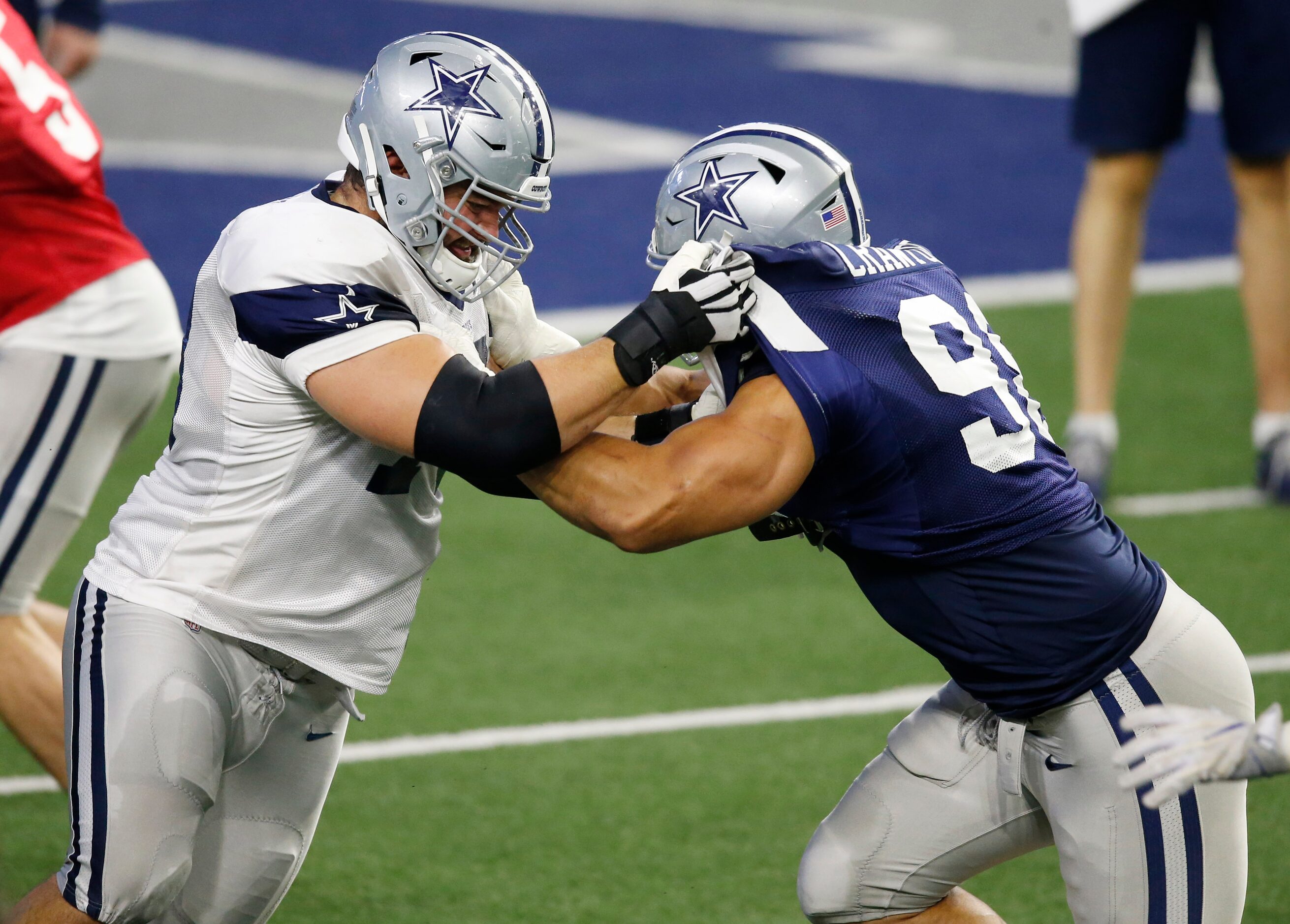 Dallas Cowboys guard Zack Martin (70) blocks Dallas Cowboys defensive end Tyrone Crawford...