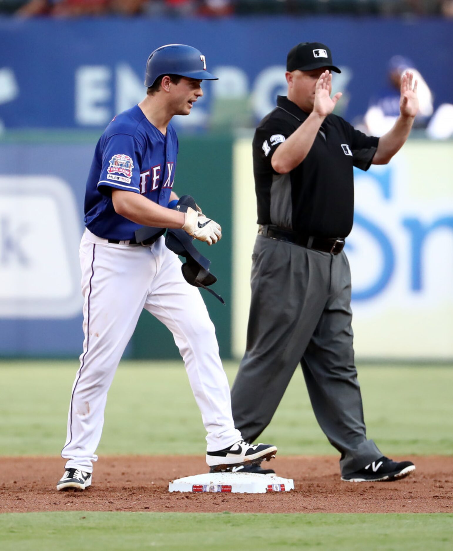 ARLINGTON, TEXAS - AUGUST 21:   Nick Solak #15 of the Texas Rangers hits a double against...