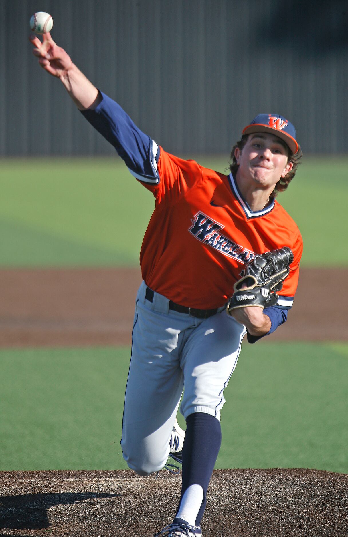 Heritage pitcher Luke Robertson (7) delivers a pitch in the fourth inning as Heritage High...