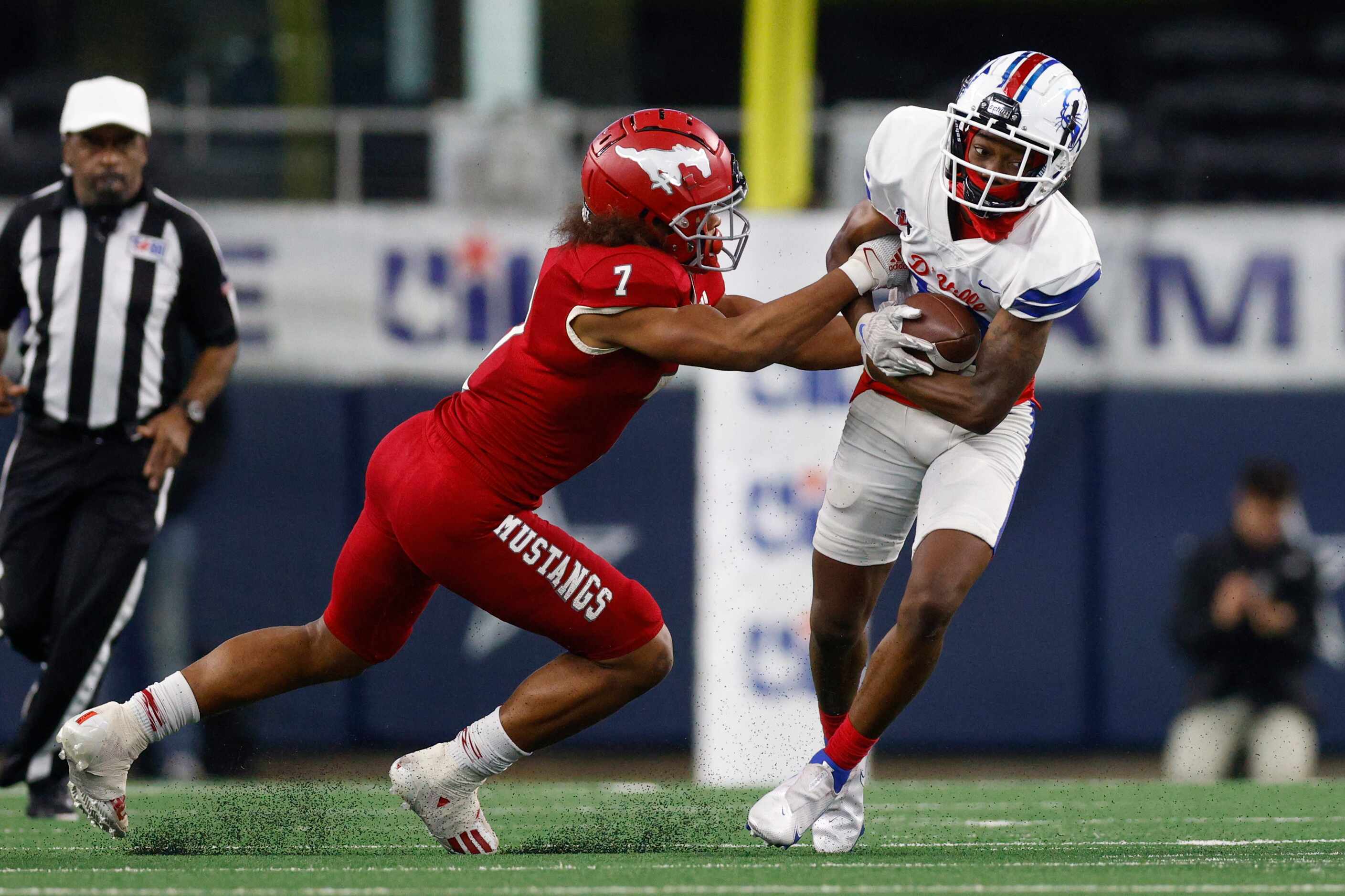 Galena Park North Shore defensive back Jayven Anderson (7) tackles Duncanville wide receiver...