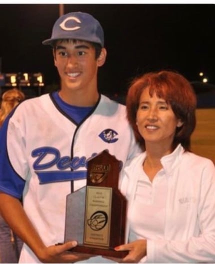 Rangers pitcher Dane Dunning and his mother, Misu, photographed during his time playing...