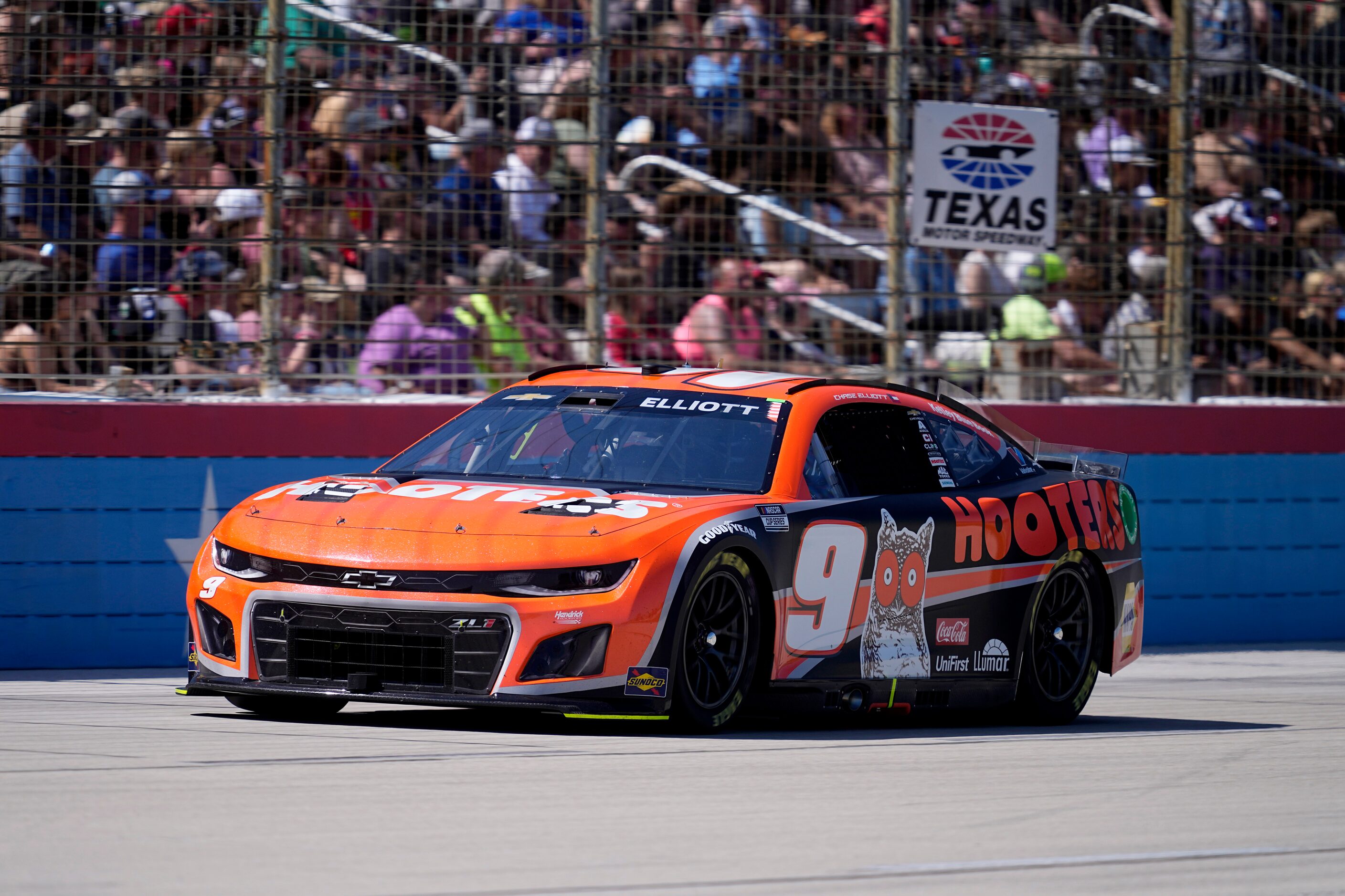 Chase Elliott heads into Turn 4 during a NASCAR Cup Series auto race at Texas Motor Speedway...