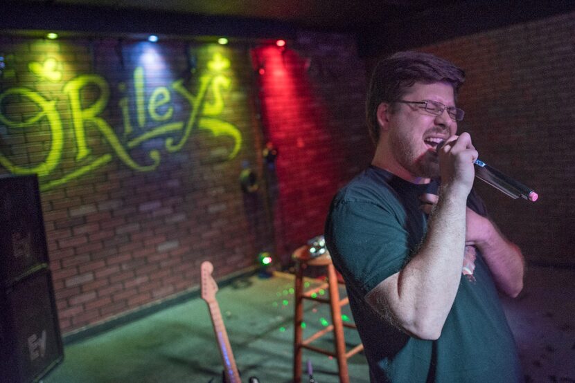 At O'Riley's, karaoke singers take the stage while host Rick Stephens operates sound and...