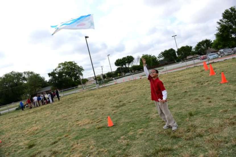 
Abraham Compas flies a kite as part of the activities for students during the festival.
