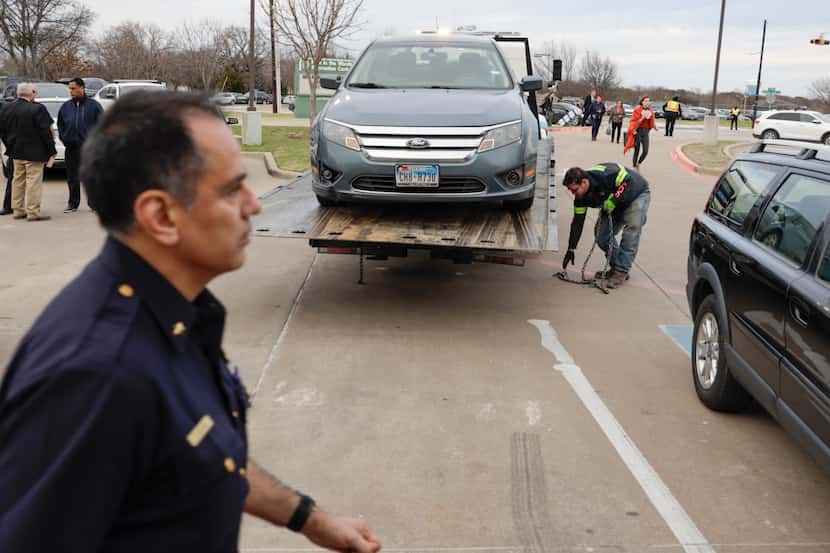 A blue Ford Fusion registered to Dallas City Council member Kevin Felder's address is towed...