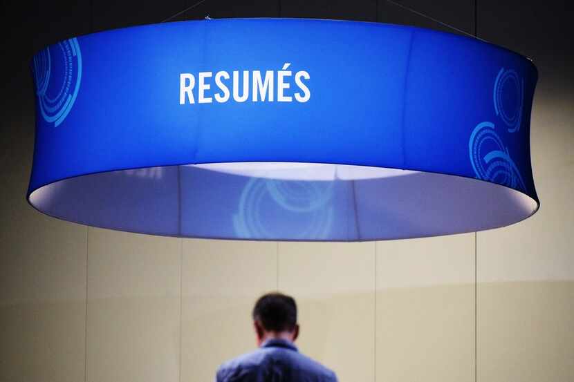(FILES) In this file photo taken on September 20, 2017, job seekers arrive at the Walter E....