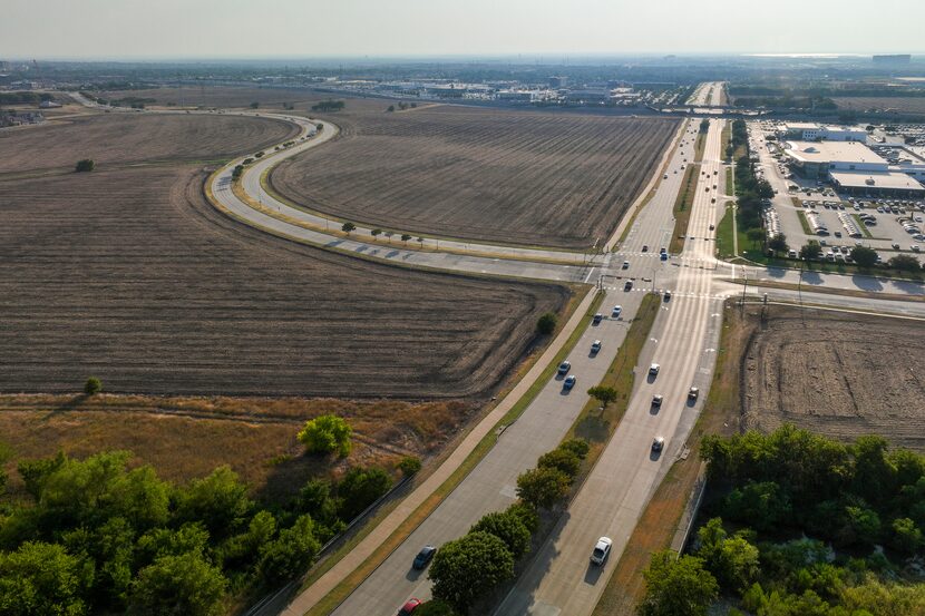 Aerial view of land at the corner of Parkwood Boulevard (running from right to left) and...