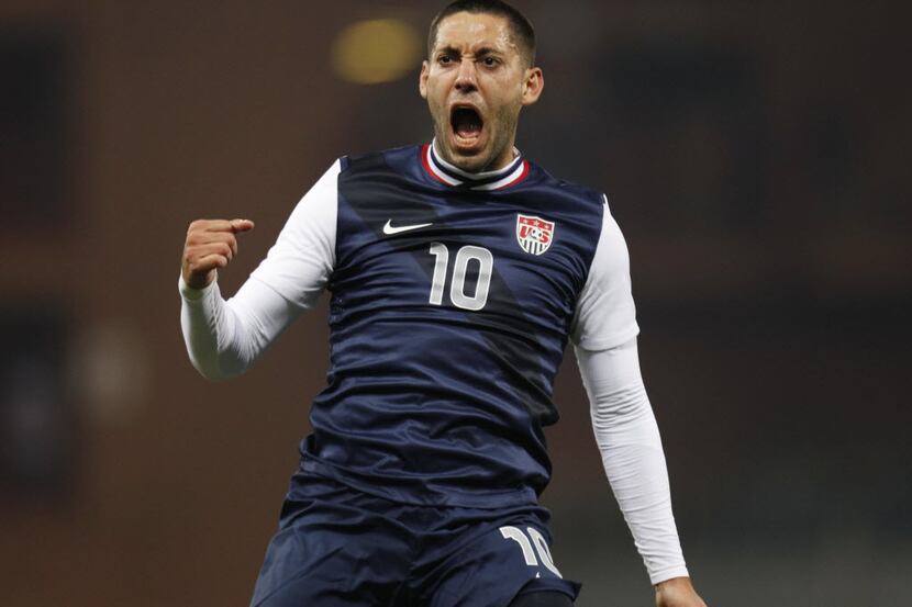 US forward Clint Dempsey celebrates after scoring during a friendly soccer match between...