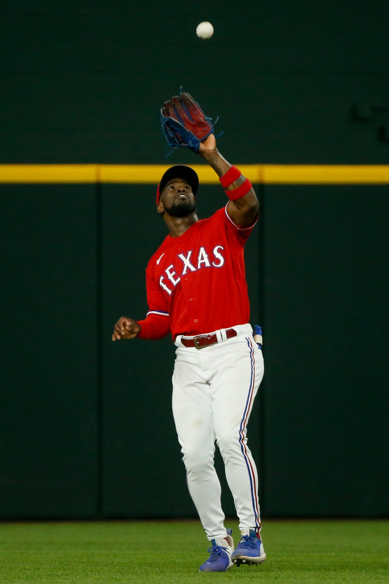 Texas Rangers center fielder Adolis Garcia (53) makes a catch to record an out during the...