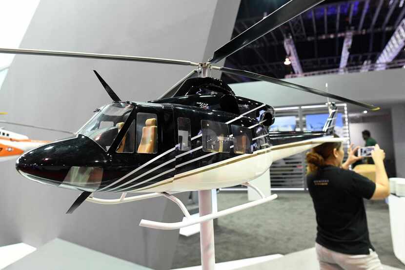 A model of a Bell 412 helicopter is display during the Singapore Airshow on February 7,...