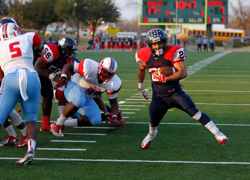 Allen's Marcus Ward (20) makes his way into the end zone to score a touchdown in a game...