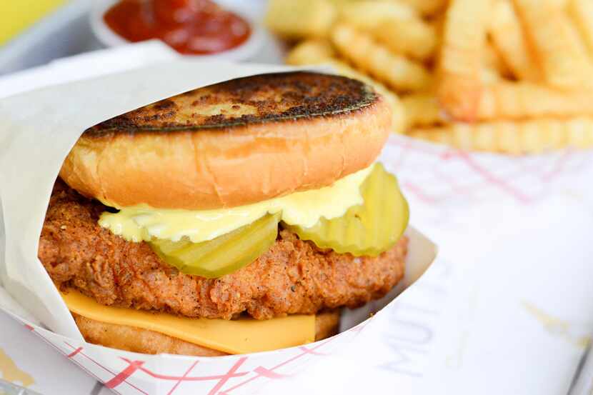 The new chicken sandwich at Mutts Canine Cantina in Uptown Dallas has upside-down buns. Get...
